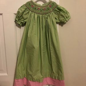 Green gingham smocked bishop dress